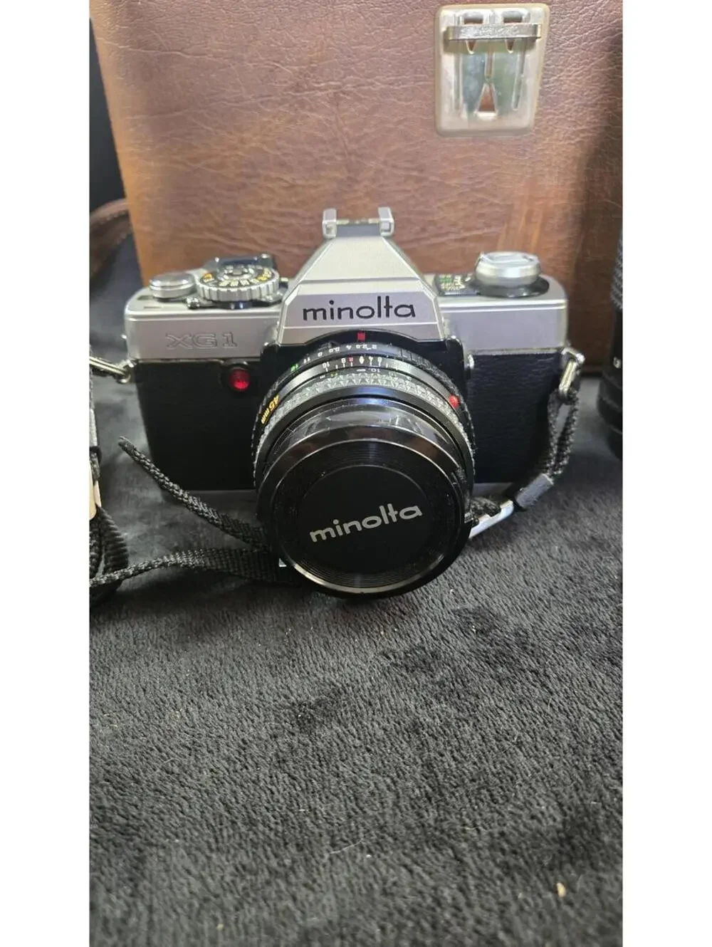 Minolta SLR 35mm Film Camera with Lens, Flash, and Carrying Case